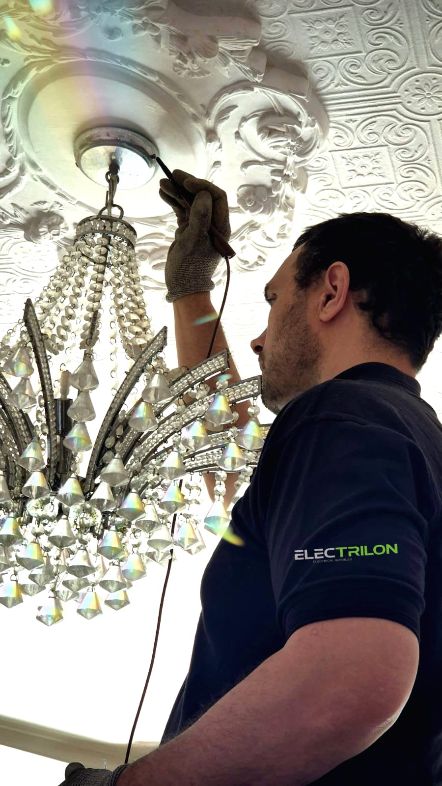 Electrician conducting EICR inspection