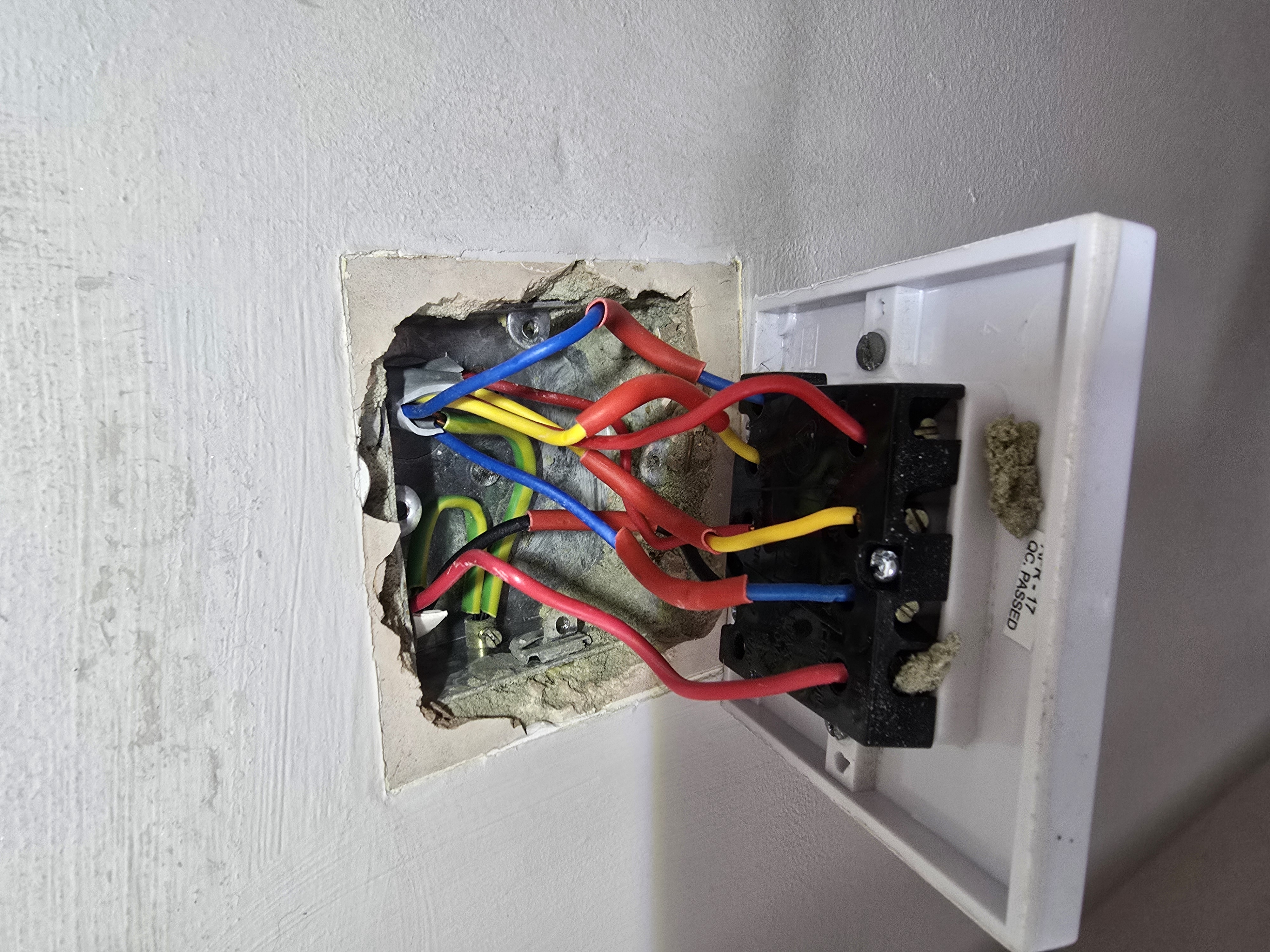 Electrician pinpointing a hidden wiring fault
